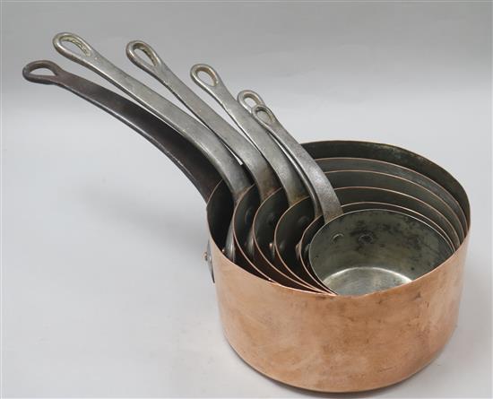 Six 19th century French copper saucepans